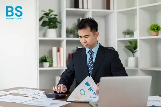 Business buyer reviewing financial reports and acquisition documents to avoid common mistakes when buying a senior care business.