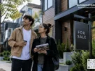 Millennial and Gen Z couple exploring a modern home for sale, representing the rise of young homeownership and the changing American Dream in the United States.