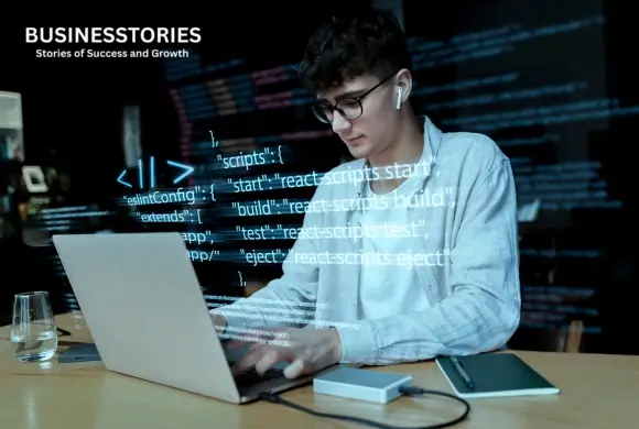 Software engineer using AI-powered vibe coding technology while developing applications on a laptop at Emergent.