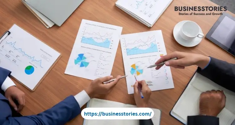 Business professionals reviewing sales charts and graphs to develop effective sales strategies.